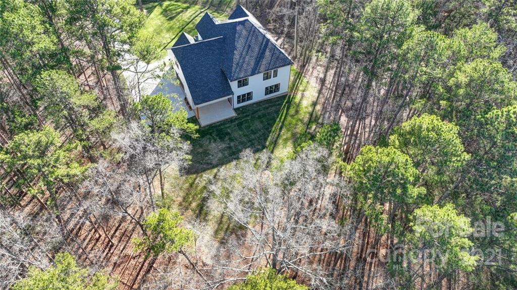3017 McLendon Road Matthews, NC 28104 - Photo 2 of 47 a view of house with an outdoor space