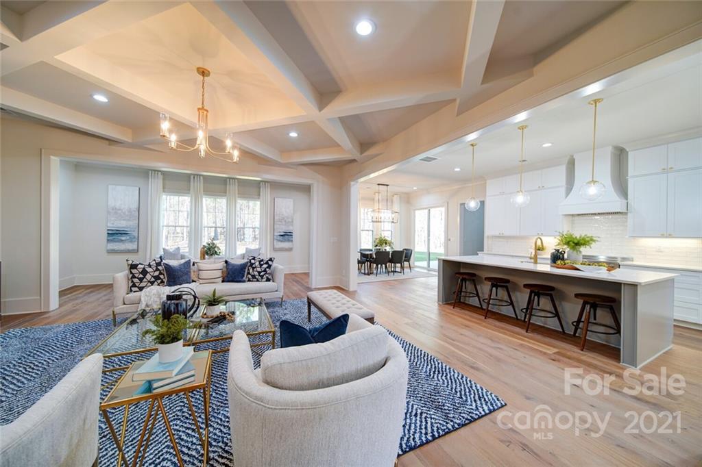 3017 McLendon Road Matthews, NC 28104 - Photo 21 of 47 a living room with furniture and a wooden floor