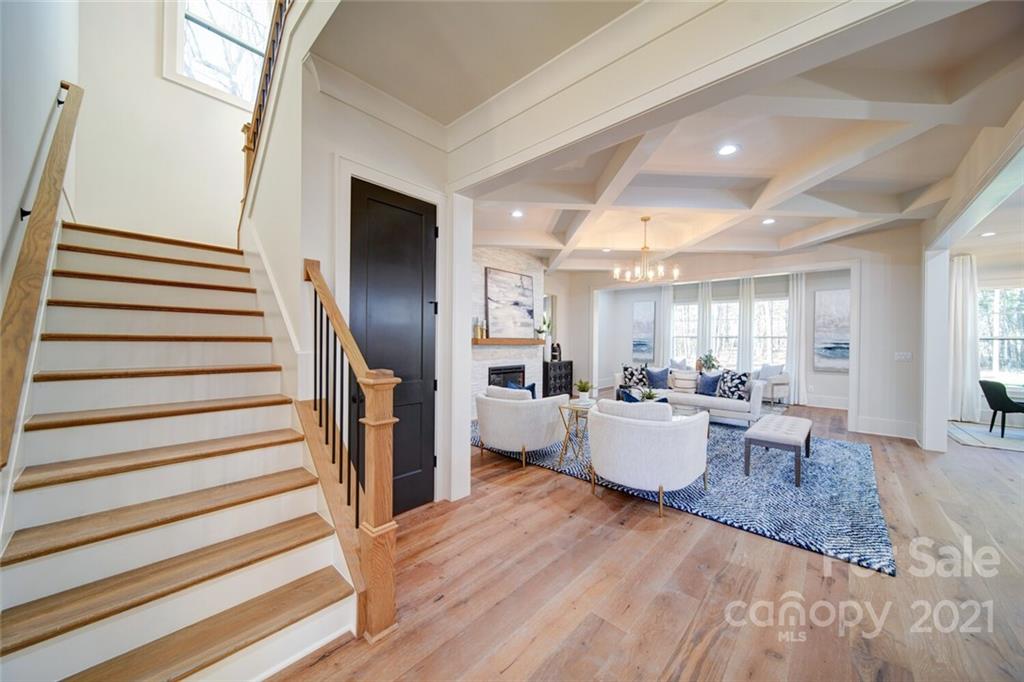 3017 McLendon Road Matthews, NC 28104 - Photo 28 of 47 a living room with furniture and wooden floor