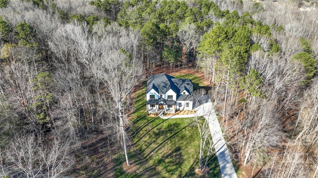 3017 McLendon Road Matthews, NC 28104 - Photo 4 of 47 a view of a yard
