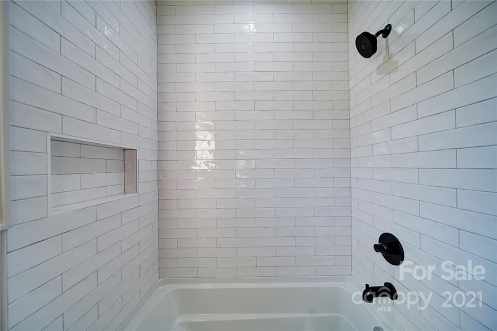 3017 McLendon Road Matthews, NC 28104 - Photo 43 of 47 a bathroom with a shower