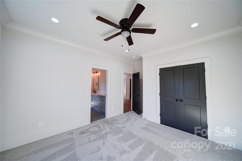 3017 McLendon Road Matthews, NC 28104 - Photo 46 of 47 a view of an empty room with a ceiling fan