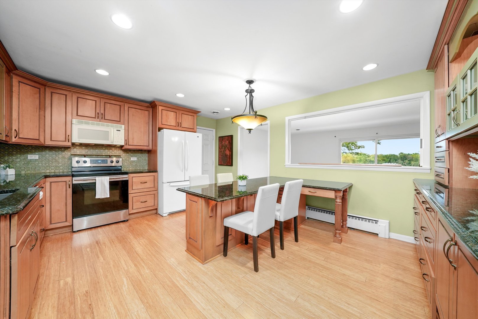 1406 Lincoln Road McHenry, IL 60051 - Photo 12 of 39 a dining room with furniture and wooden floor