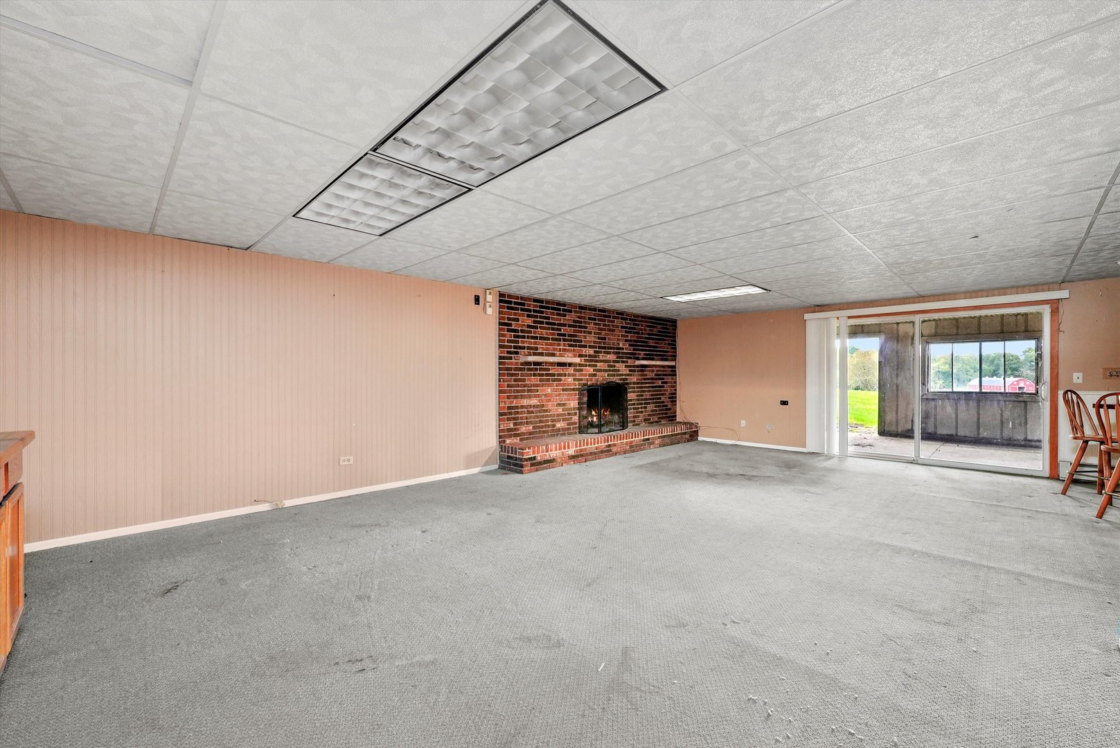 1406 Lincoln Road McHenry, IL 60051 - Photo 25 of 39 a view of a livingroom with an empty space and a window