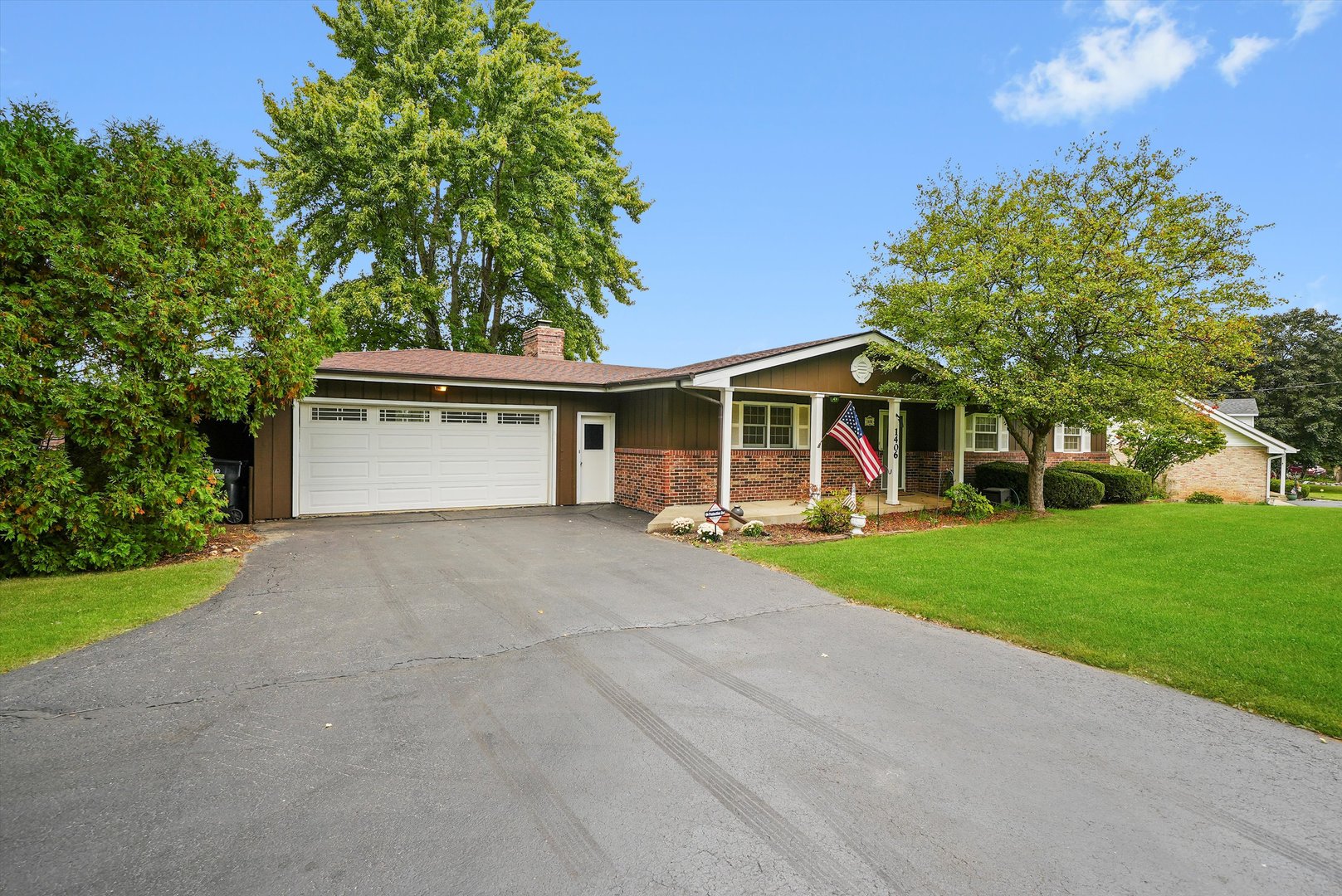 1406 Lincoln Road McHenry, IL 60051 - Photo 8 of 39 front view of a house with a yard