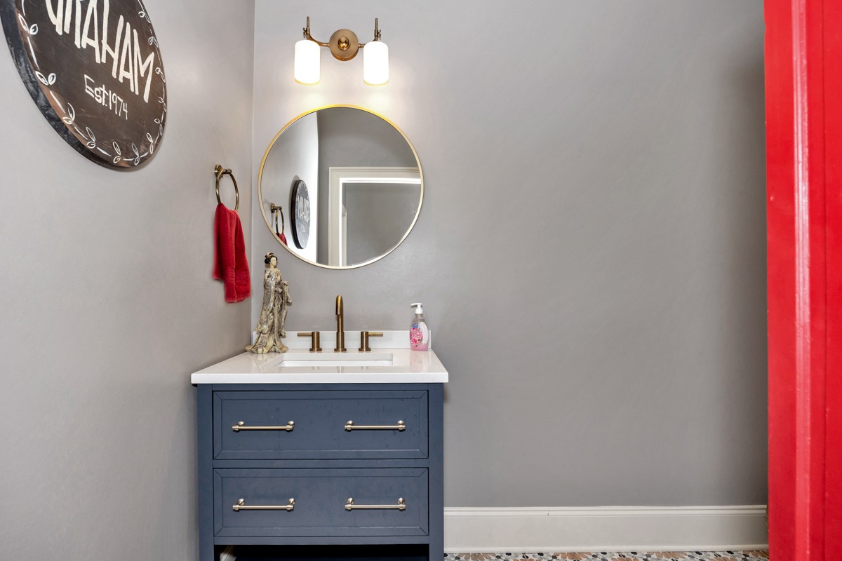 21 Meeting House Road Ardmore, TN 38449 - Photo 22 of 62 a bathroom with a sink and a mirror