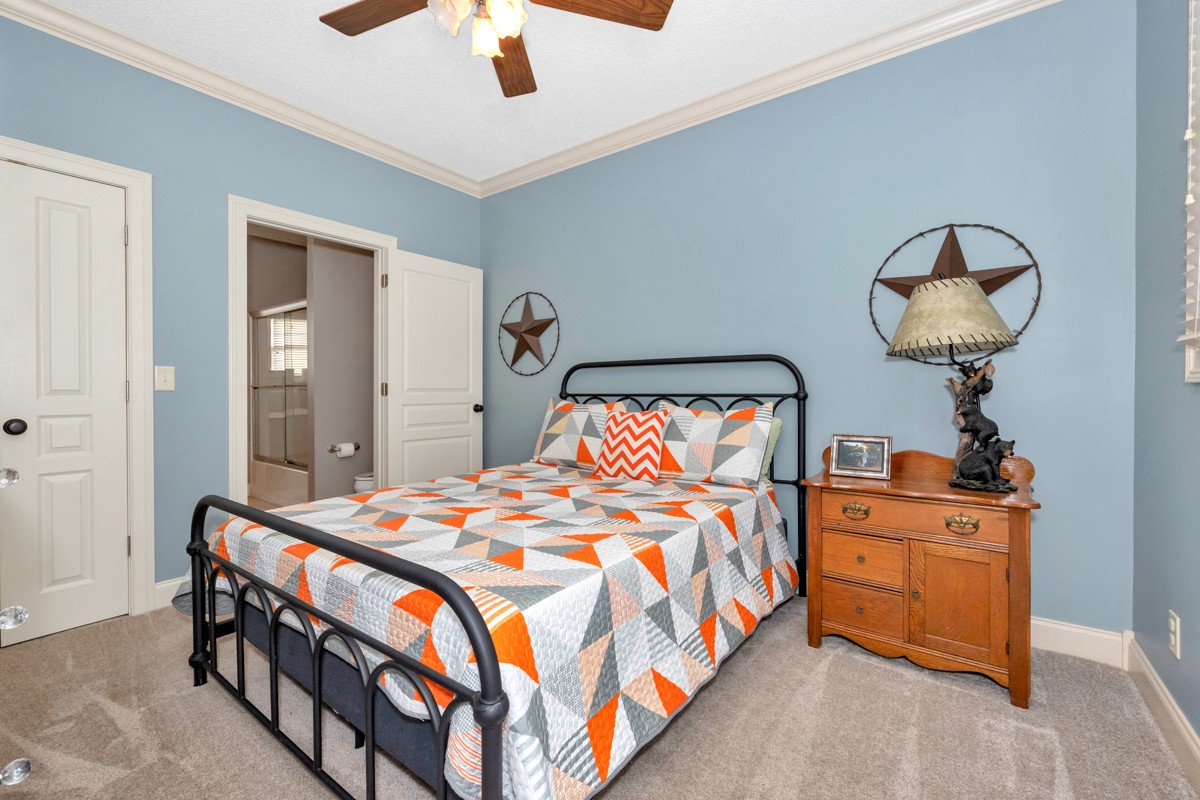 21 Meeting House Road Ardmore, TN 38449 - Photo 23 of 62 a bedroom with a bed and wooden floor