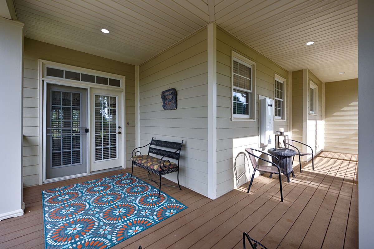 21 Meeting House Road Ardmore, TN 38449 - Photo 37 of 62 a balcony with furniture and wooden floor