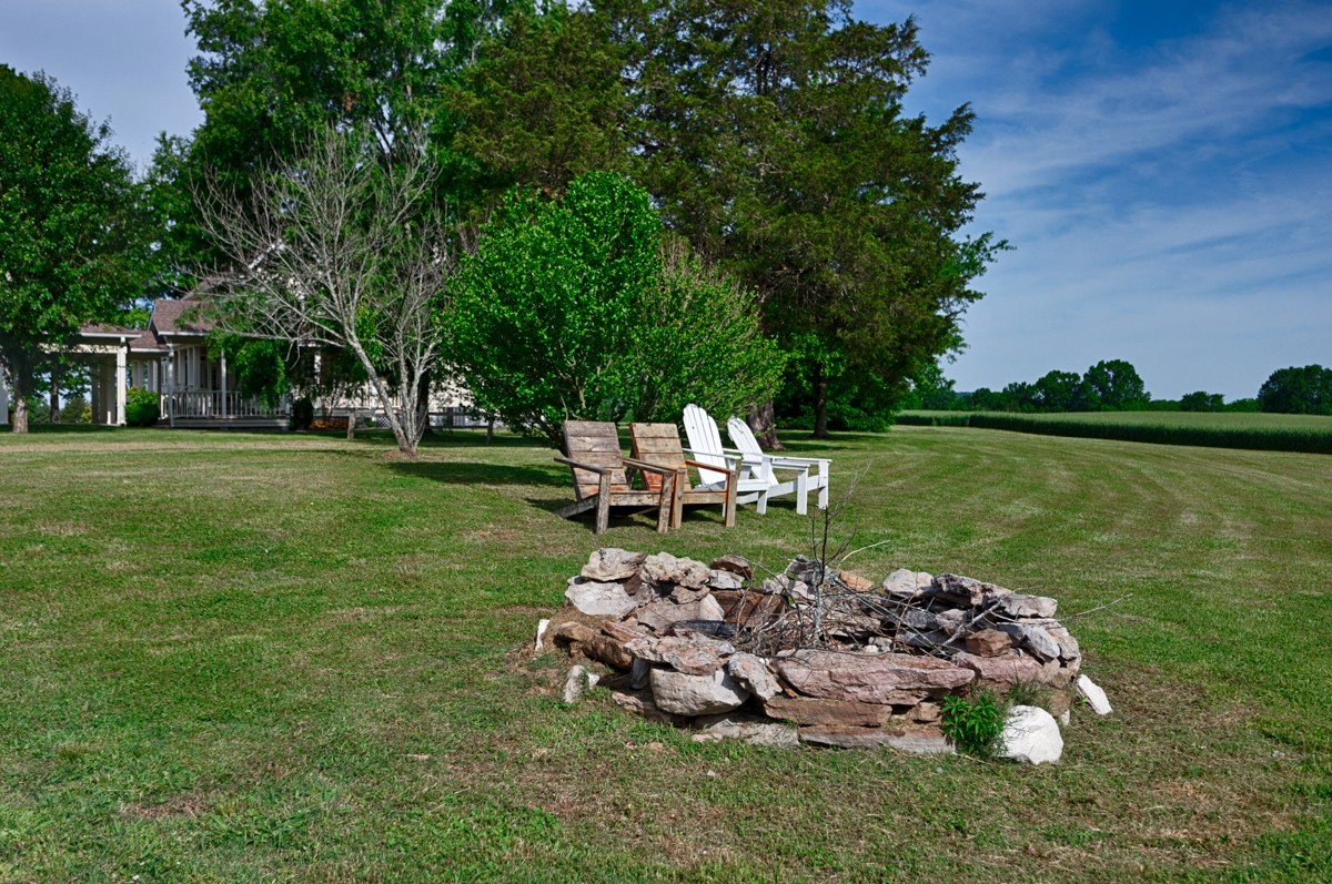21 Meeting House Road Ardmore, TN 38449 - Photo 39 of 62 a garden with a bench and trees