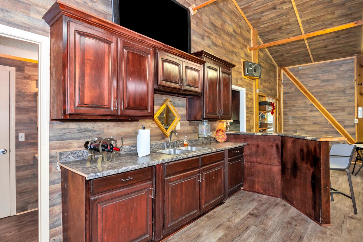 21 Meeting House Road Ardmore, TN 38449 - Photo 47 of 62 a kitchen with sink and cabinets