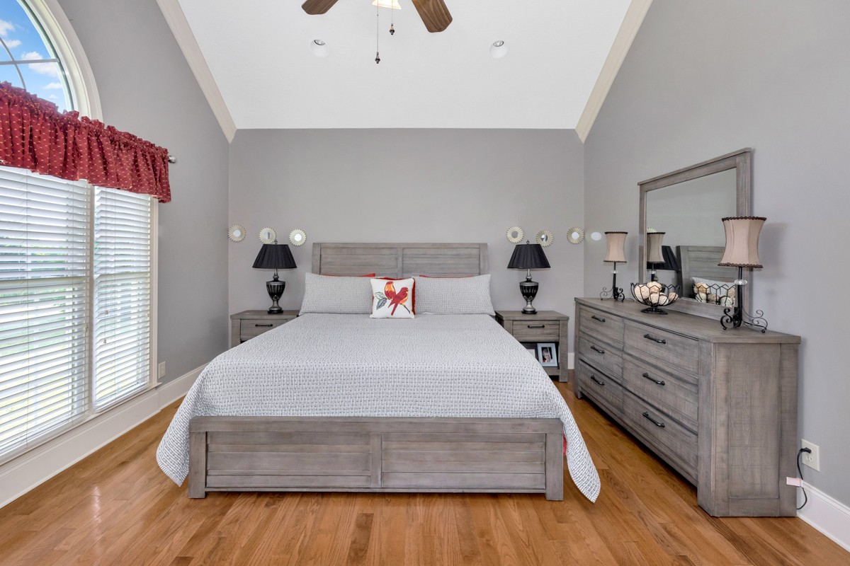 21 Meeting House Road Ardmore, TN 38449 - Photo 9 of 62 a spacious bedroom with a bed and wooden floor