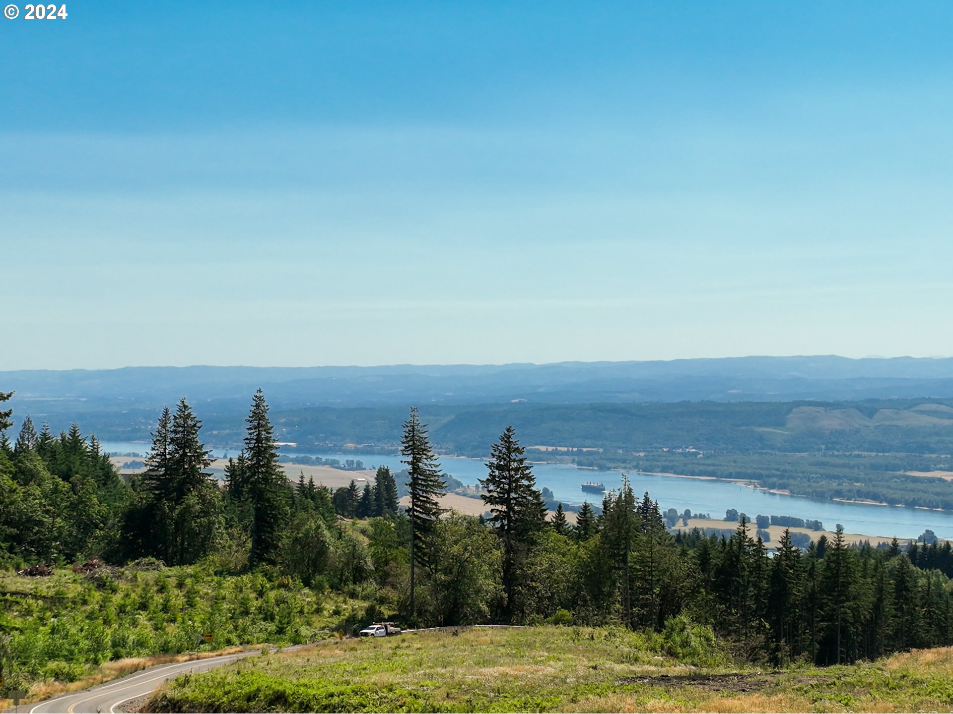 0 Green Mountain Road, Unit 2 Kalama, WA 98625 - Photo 2 of 12 an aerial view of a house with a yard