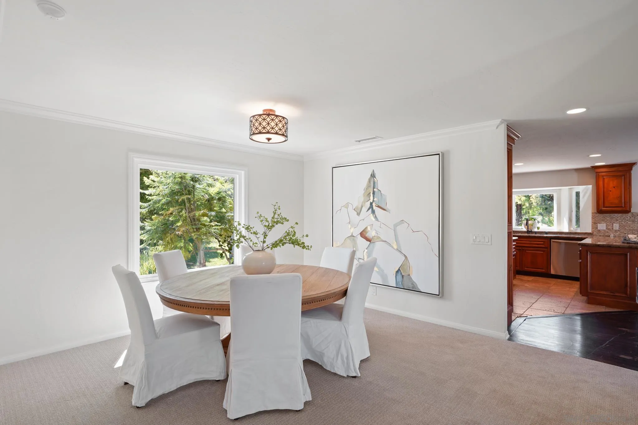 1482 Rancho Encinitas Drive Encinitas, CA 92024 - Photo 35 of 75 a view of a dining room with furniture and a window