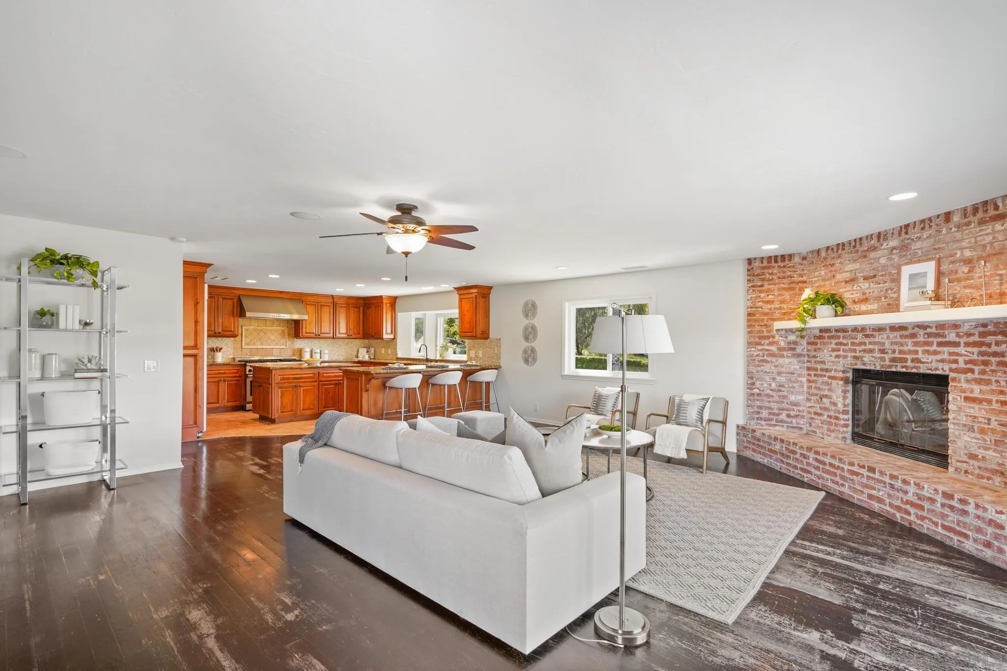 1482 Rancho Encinitas Drive Encinitas, CA 92024 - Photo 48 of 75 a living room with furniture and a fireplace