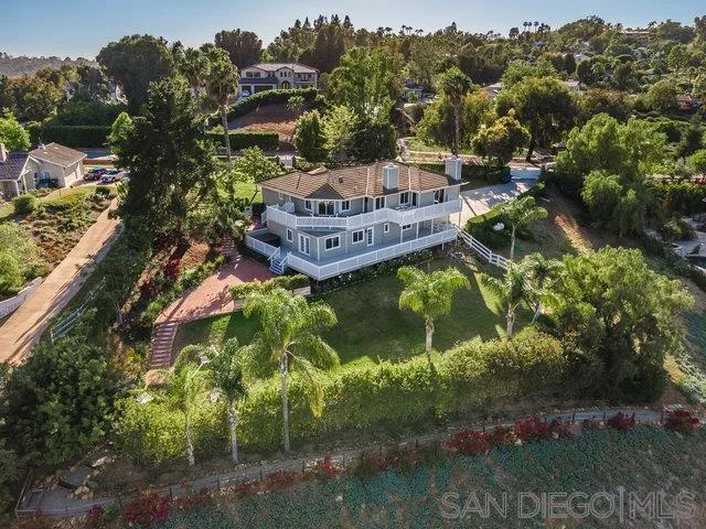 1482 Rancho Encinitas Drive Encinitas, CA 92024 - Photo 75 of 75 a aerial view of a house with a garden