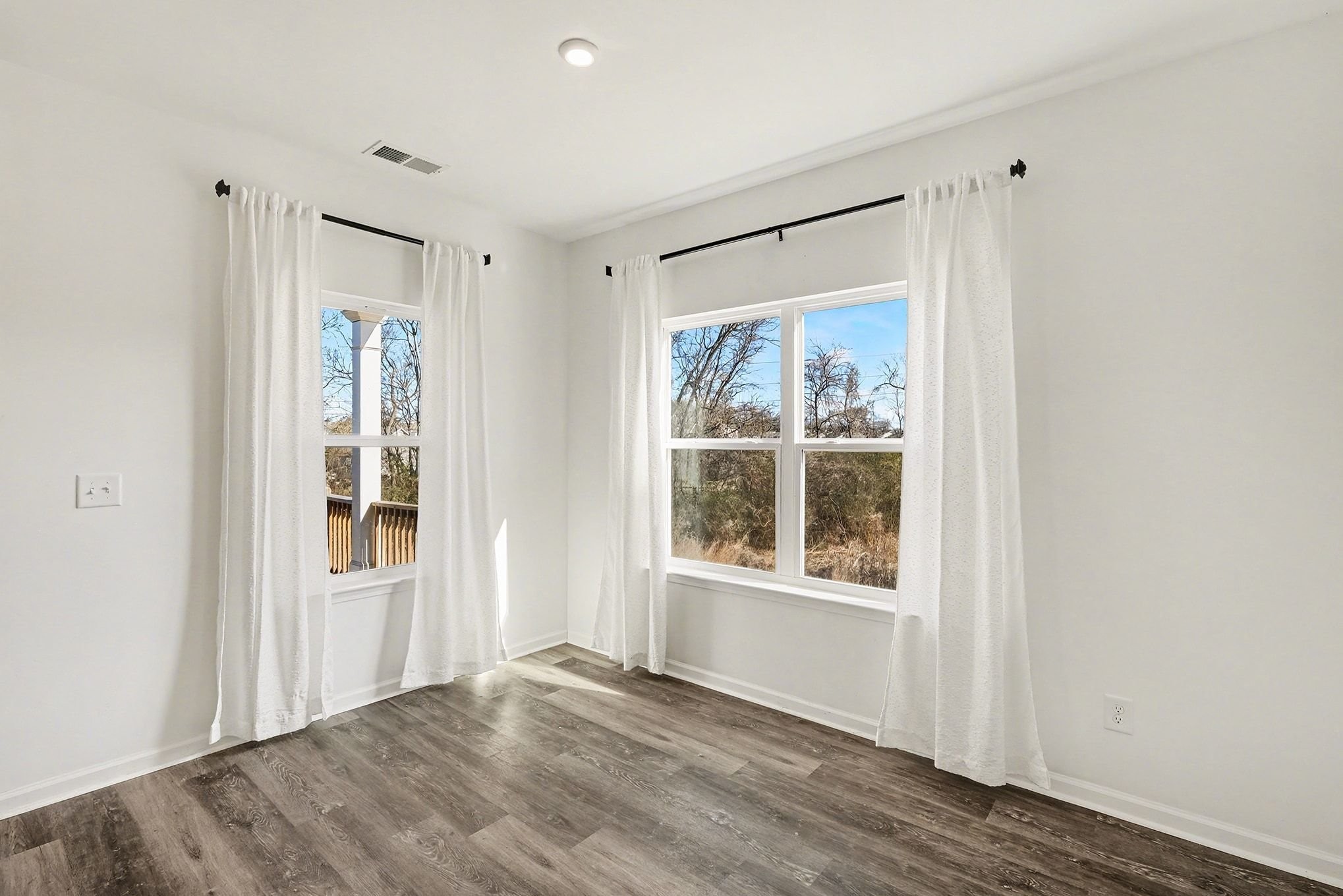 1972 Susan Road Columbia, TN 38401 - Photo 11 of 29 a view of an empty room with wooden floor and a window
