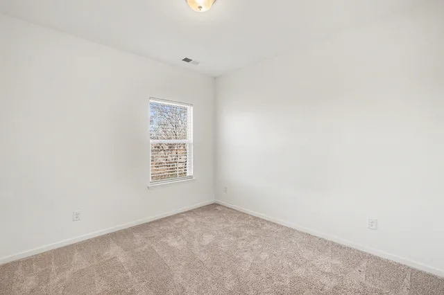 an empty room with closet