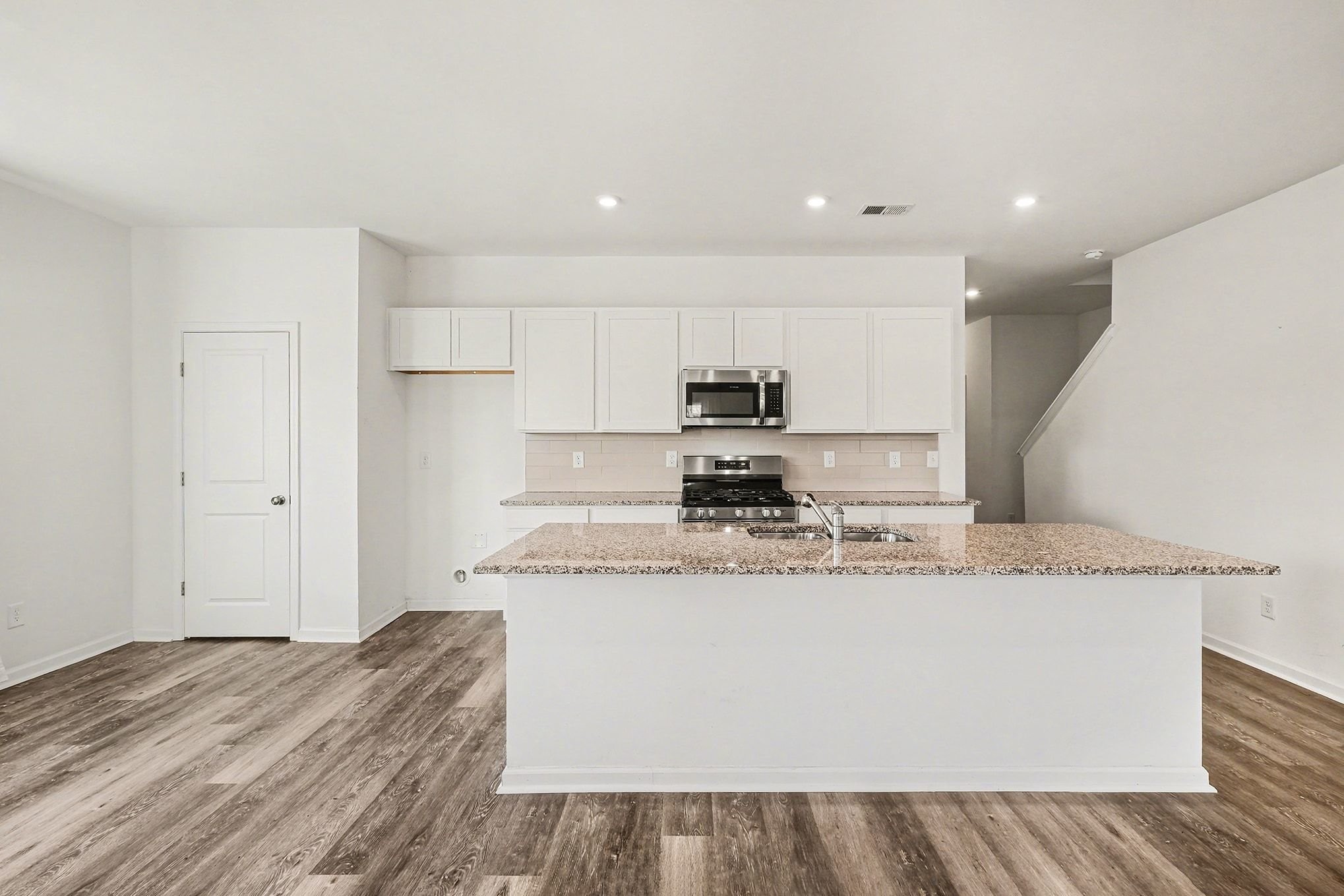 1972 Susan Road Columbia, TN 38401 - Photo 10 of 29 a large kitchen with stainless steel appliances granite countertop a stove a sink and a refrigerator