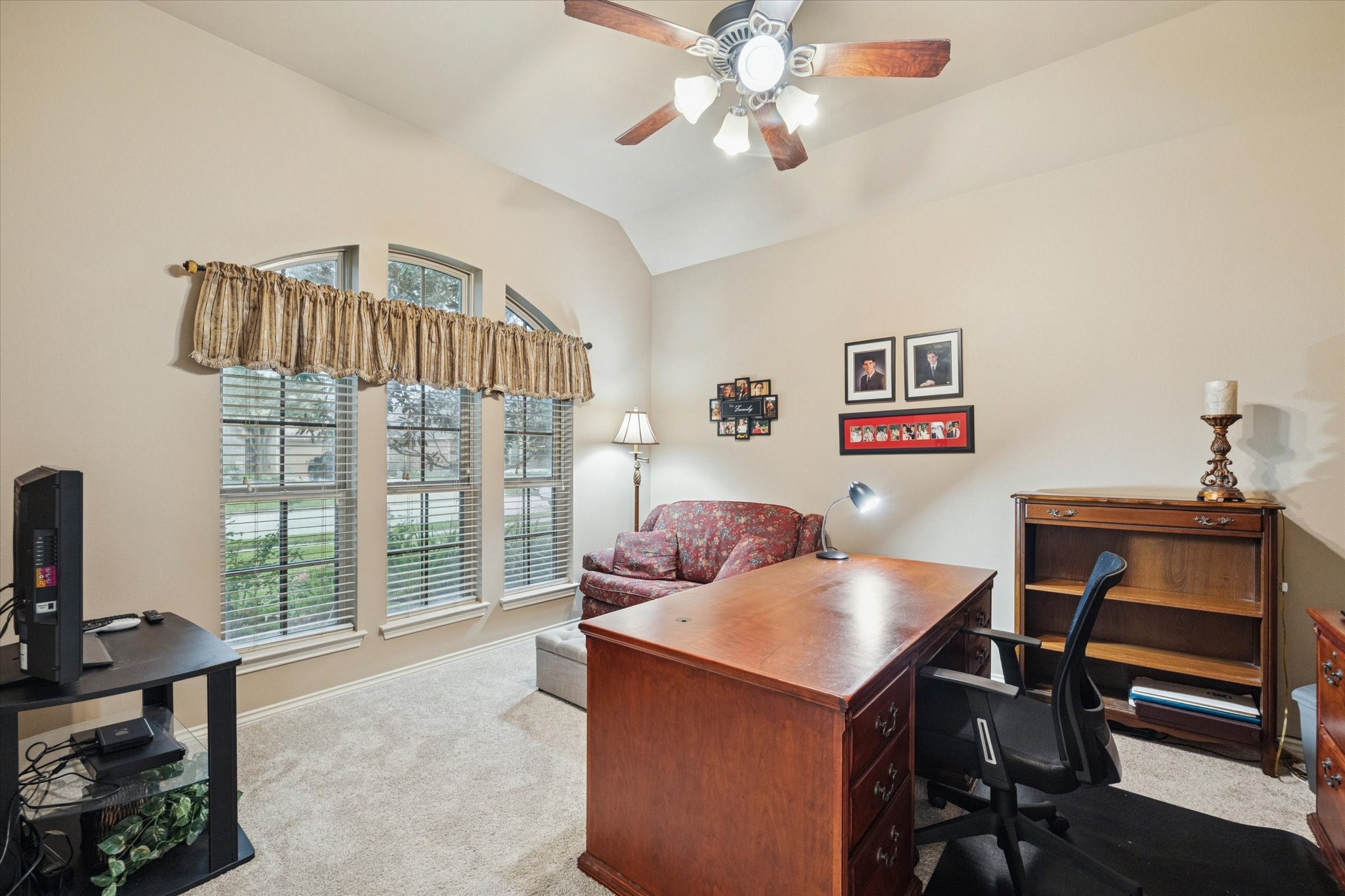 5231 Stoneridge Court Rosenberg, TX 77471 - Photo 4 of 31 A versatile study/living area with vaulted ceilings and abundant natural light—perfect for a formal sitting room, additional lounge space, or customized to suit your lifestyle.