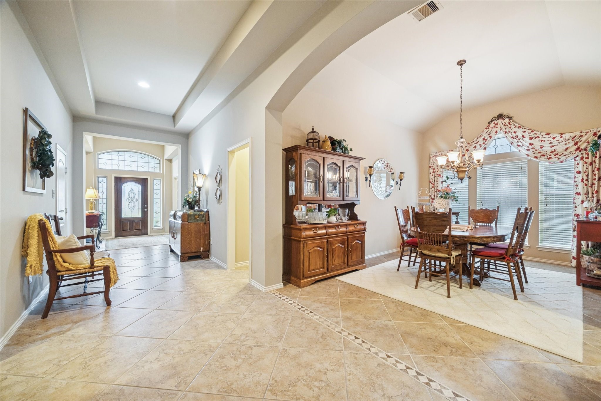 5231 Stoneridge Court Rosenberg, TX 77471 - Photo 7 of 31 Sweeping sightlines connect the kitchen, living, and dining areas, enhancing the home’s spacious and functional design.