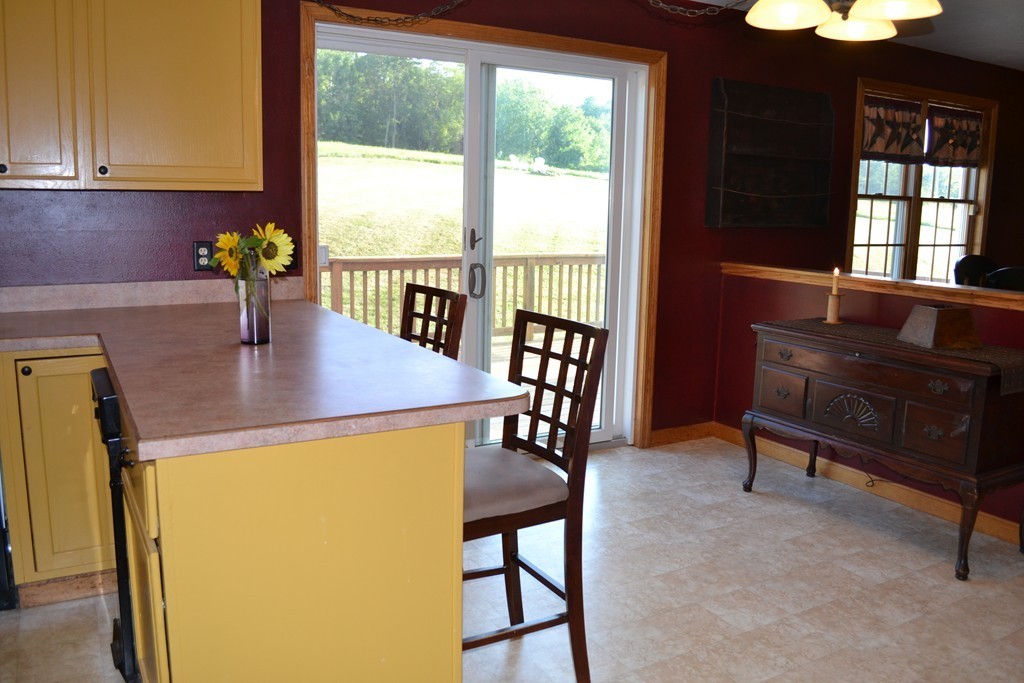 156 Reed Street Warren, MA 01083 - Photo 5 of 30 a view of a dining room with furniture and window