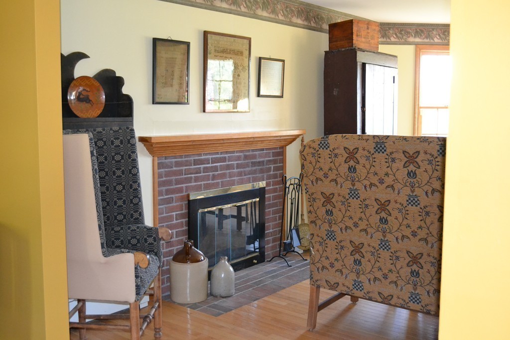 156 Reed Street Warren, MA 01083 - Photo 8 of 30 a living room with furniture and a fireplace