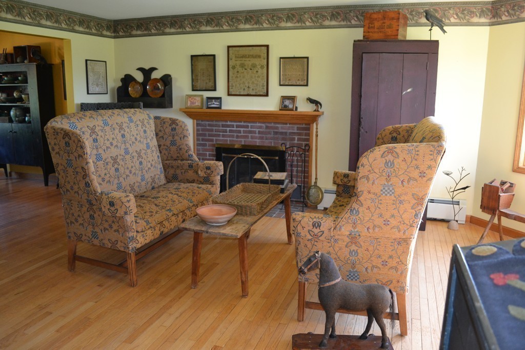 156 Reed Street Warren, MA 01083 - Photo 10 of 30 a living room with furniture and a fireplace