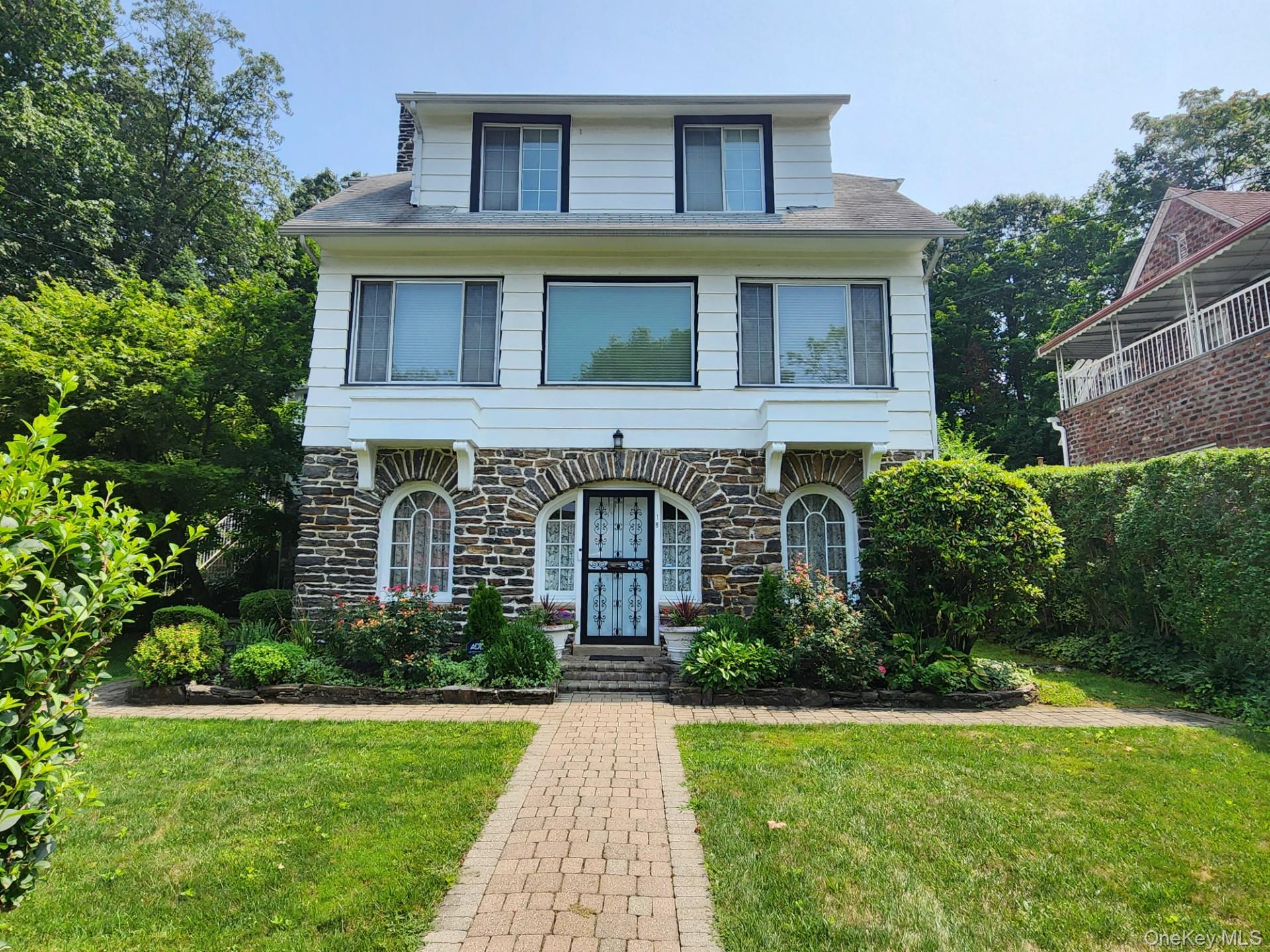 19 Esplanade Mount Vernon, NY 10553 - Photo 2 of 50 a front view of a house with garden