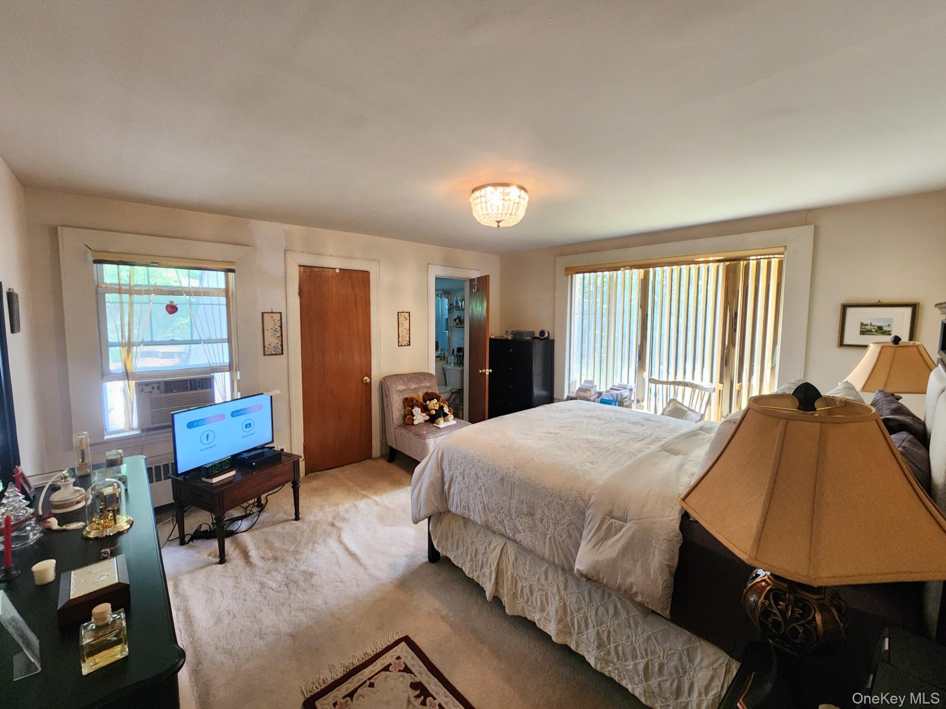 19 Esplanade Mount Vernon, NY 10553 - Photo 28 of 50 a bedroom with a bed and wooden floor