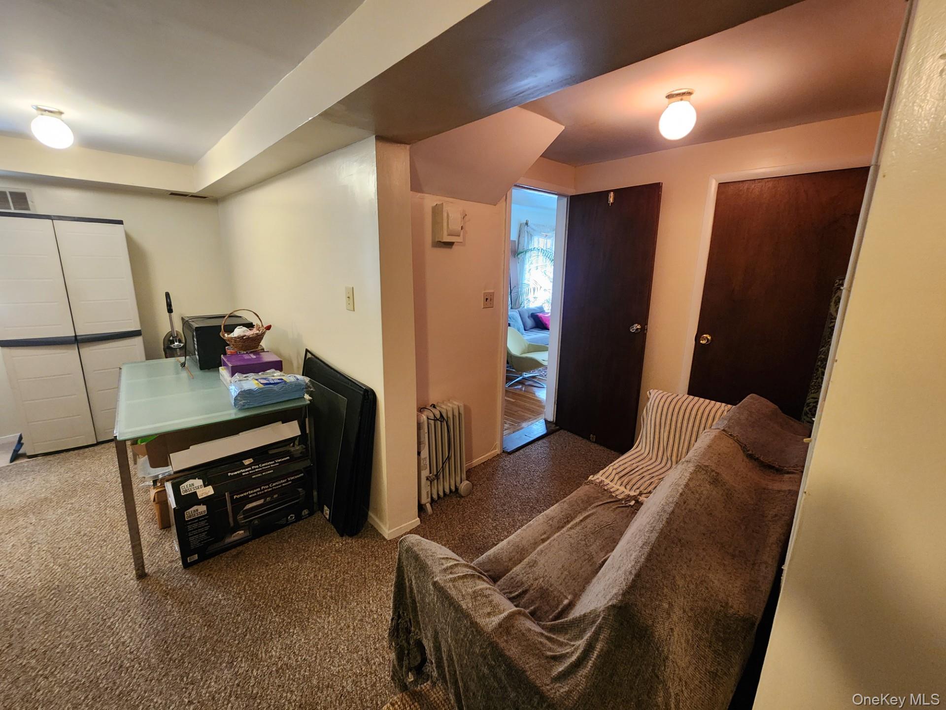 19 Esplanade Mount Vernon, NY 10553 - Photo 41 of 50 a living room with furniture and a flat screen tv