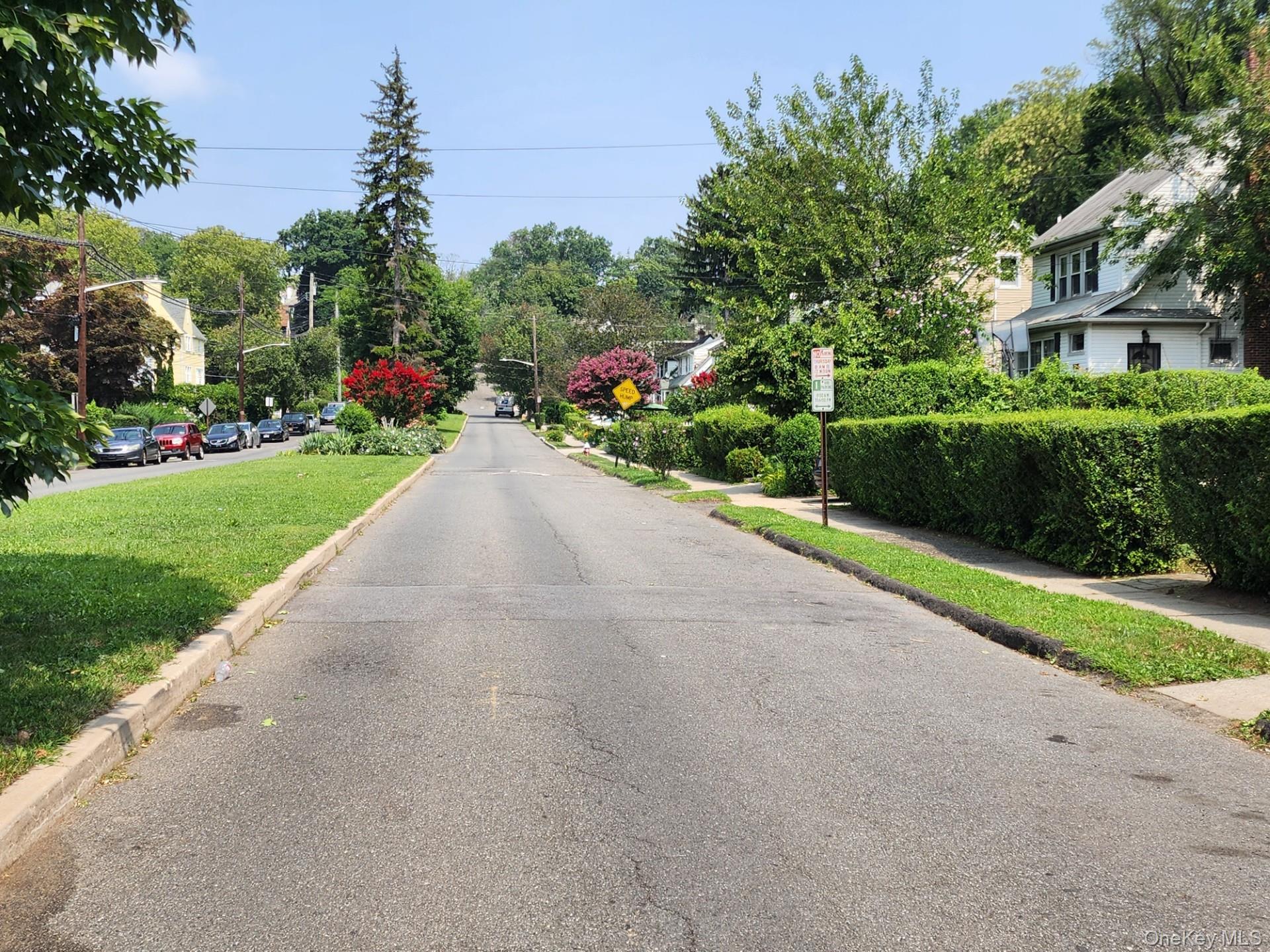 19 Esplanade Mount Vernon, NY 10553 - Photo 50 of 50 a view of a garden with a building in the background