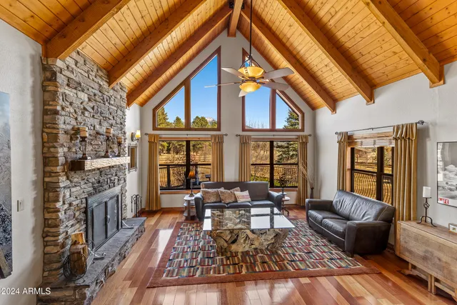 a view of a dirt road with a building in the background