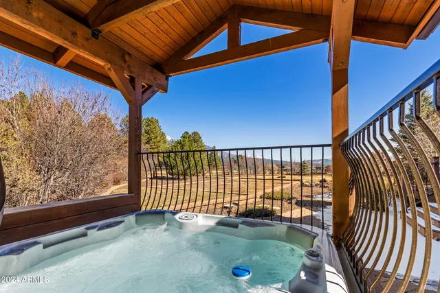 a view of a house with a snow in the yard