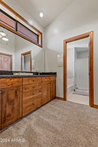 a view of a chairs on wooden deck