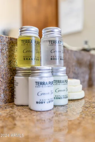 a roof deck with a table and chairs