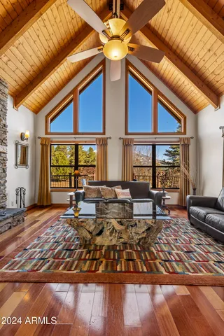 a workspace with furniture and wooden floor