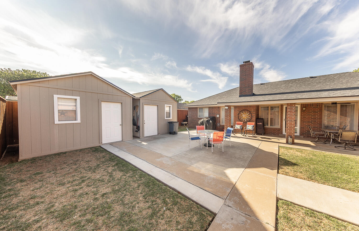 5810 80th Street Lubbock, TX 79424 - Photo 24 of 29 a view of a house with outdoor space and sitting area