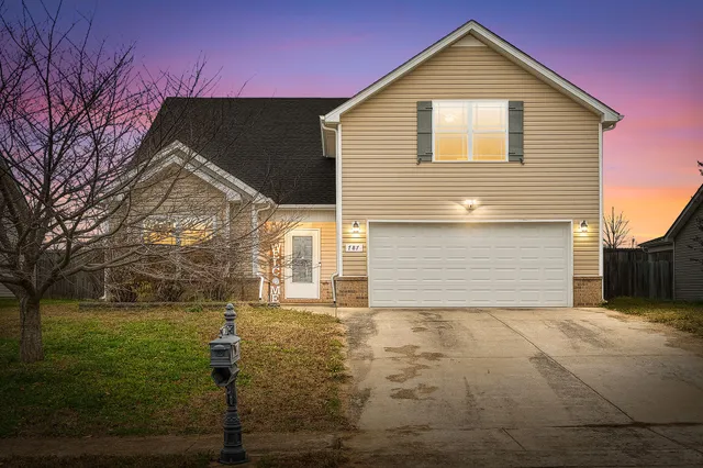 a front view of house with yard