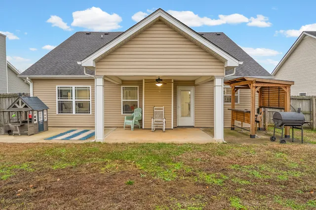 a front view of a house with a patio