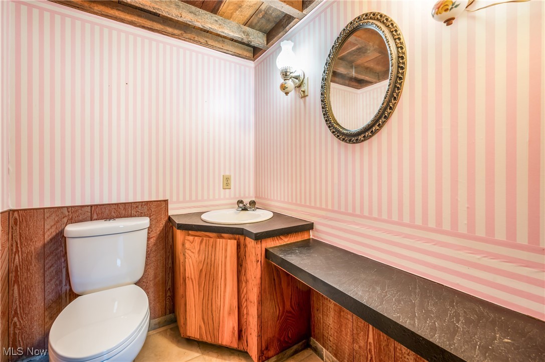 3210 Oser Road Norton, OH 44203 - Photo 27 of 47 Bathroom featuring vanity, tile patterned flooring, and toilet