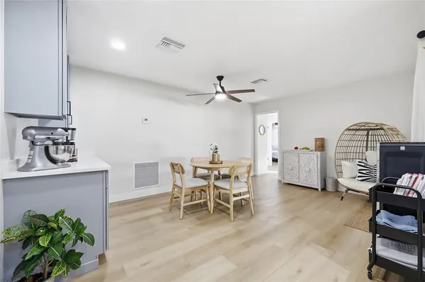 a view of a garage with rack and bicycle