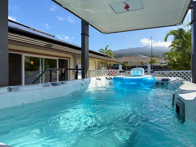 a view of a house with backyard porch and patio