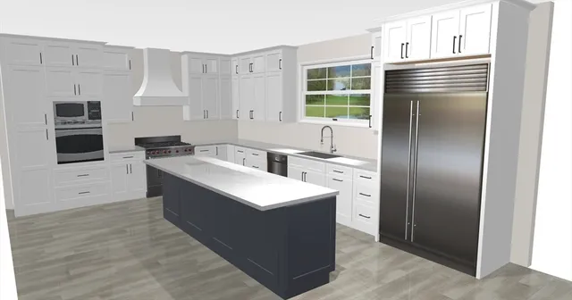 a kitchen with stainless steel appliances a refrigerator a sink a stove and cabinets