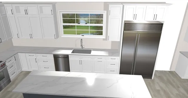 a kitchen with stainless steel appliances sink a refrigerator and window