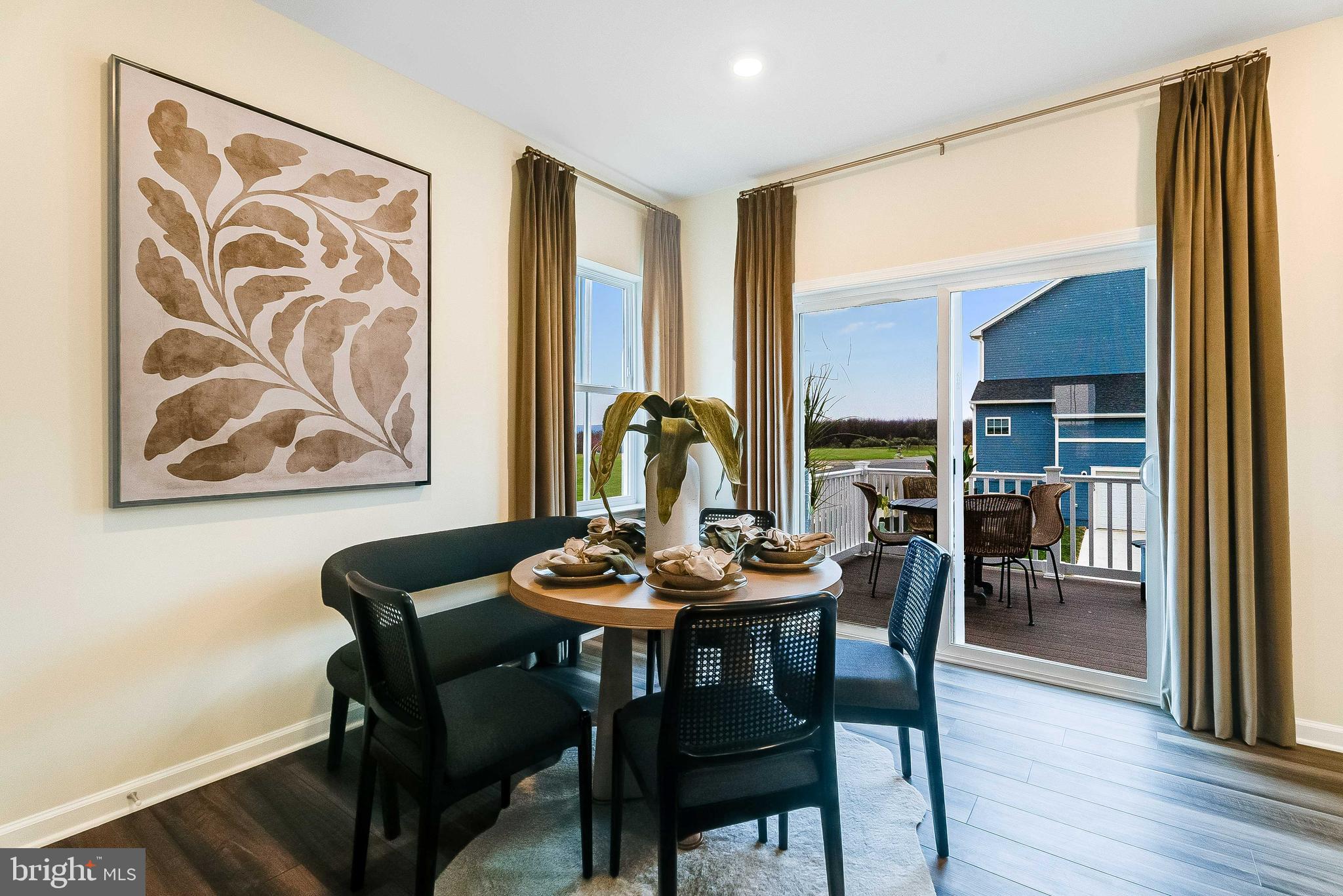 1260 Red Clover Lane Ranson, WV 25438 - Photo 10 of 24 a dining room with furniture and wooden floor