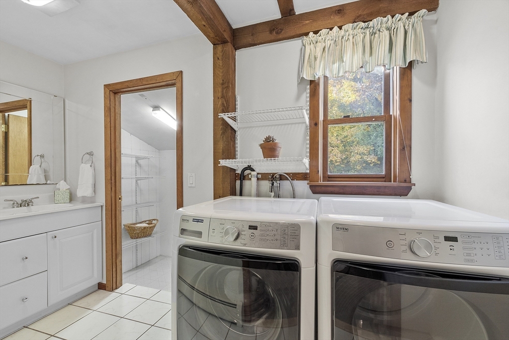 51 Kenney Road Middleton, MA 01949 - Photo 14 of 33 a bathroom with a sink and a mirror