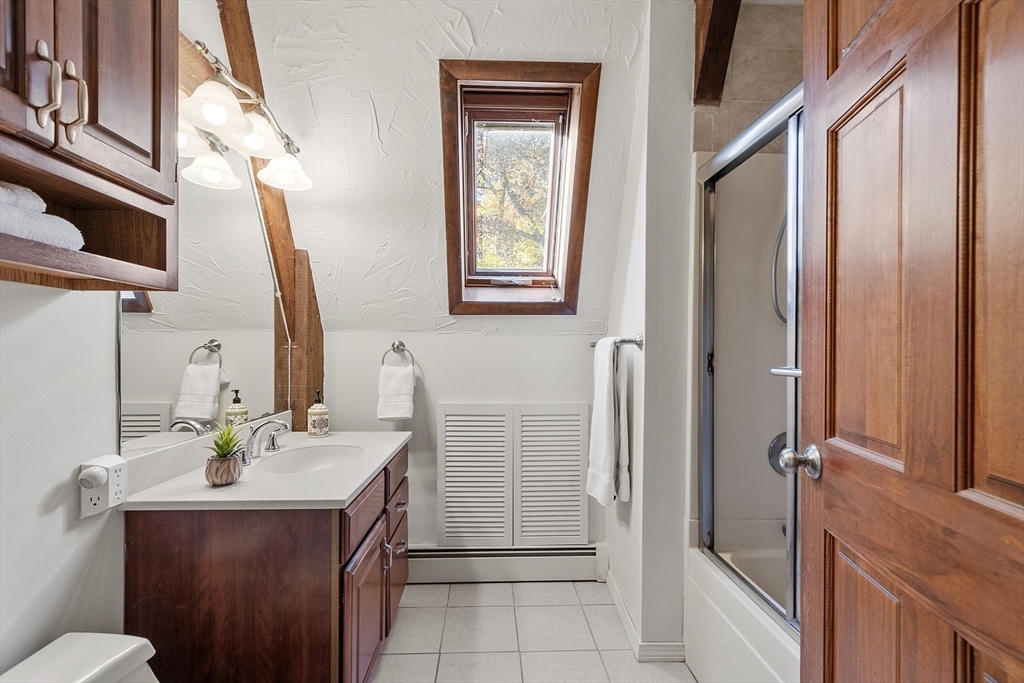 51 Kenney Road Middleton, MA 01949 - Photo 20 of 33 a bathroom with a sink a toilet and shower
