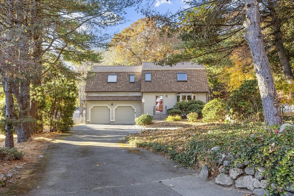51 Kenney Road Middleton, MA 01949 - Photo 3 of 33 a front view of a house with a yard