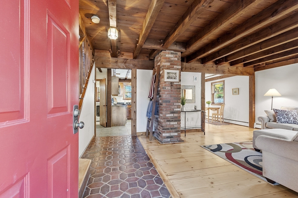 51 Kenney Road Middleton, MA 01949 - Photo 5 of 33 a hallway with a couch