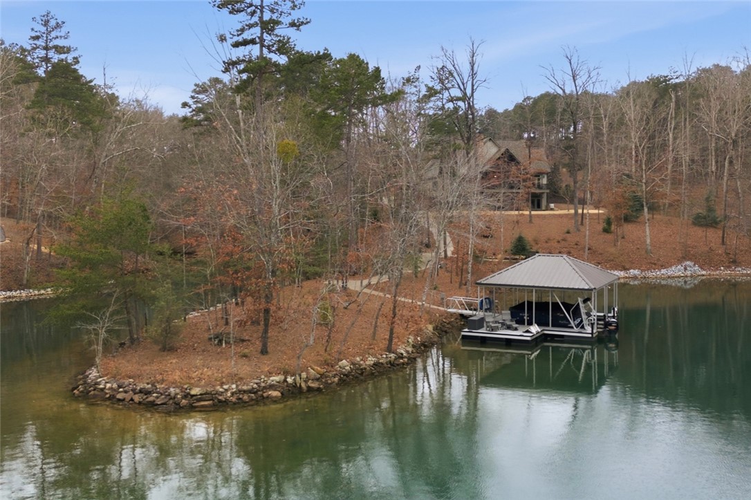 412 Walking Fern Way Seneca, SC 29672 - Photo 2 of 45 This serene lakefront property is nestled 5.5 private acres.